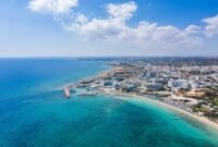 46661972_aerial-view-of-the-beach-in-ayia-napa-resort-town-cyprus-scaled.jpg
